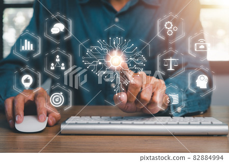 Artificial Intelligence AI, Businessman hand touching holographic brain Artificial Intelligence (AI) with business icon, Internet of Things IoT concept. Artificial Intelligence AI, Businessman hand touching holographic brain Artificial Intelligence (AI) with business icon, Internet of Things IoT concept. 82884994