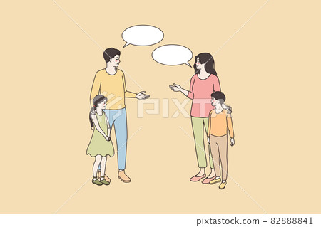 Smiling parents of teen children talk outside Smiling parents of teen children talk outside 82888841