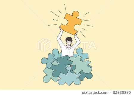 Happy man hold jigsaw puzzle find business solution Happy man hold jigsaw puzzle find business solution 82888880