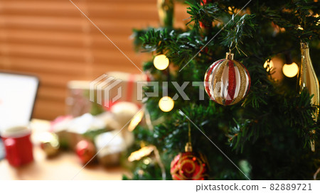 Gold and red bauble decoration Christmas tree. Gold and red bauble decoration Christmas tree. 82889721
