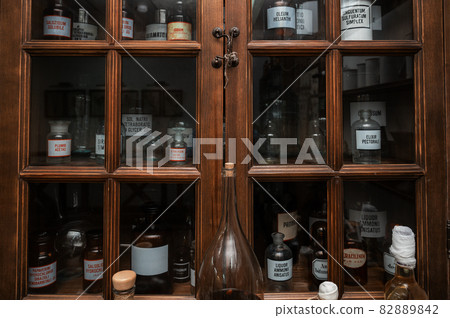 Empty scent bottles in old pharmacy 82889842