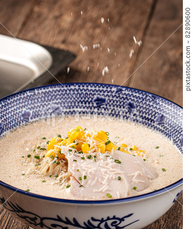 Bowl of cheese ramen noodle soup with corn Bowl of cheese ramen noodle soup with corn 82890600