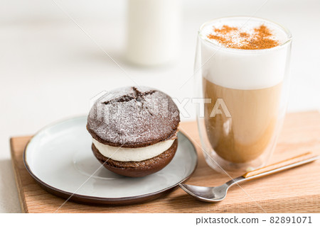 Coffee latte with whoopie pie cream dessert 82891071