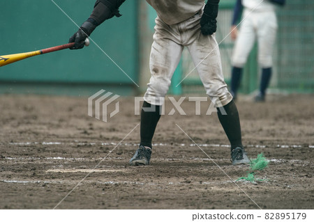 A batter who stands in the batter's box and performs routines during a baseball game A batter who stands in the batter's box and performs routines during a baseball game 82895179