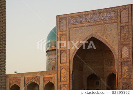 Uzbekistan Bukhara Mill Arab Madrasa dyed in the sunset 82895592