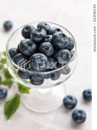 Blueberries on tile background Blueberries on tile background 82896240
