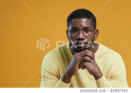 African American Man on Yellow Background African American Man on Yellow Background 82897162