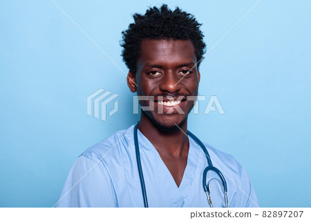 Portrait of african american nurse smiling in studio Portrait of african american nurse smiling in studio 82897207
