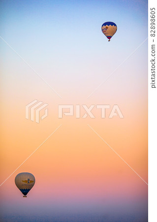 Bright hot air balloons in sky of Cappadocia, Turkey 82898605