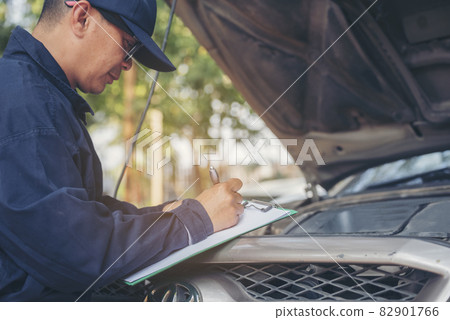 Mechanic car service auto garage in automotive mobile center. Technician workshop repair engine motor vehicles service mechanical engineering business. Automobile mechanic hands car repairs technic Mechanic car service auto garage in automotive mobile center. Technician workshop repair engine motor vehicles service mechanical engineering business. Automobile mechanic hands car repairs technic 82901766