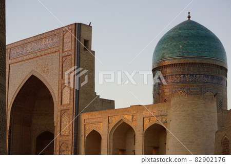 Uzbekistan Bukhara Miri Arab Madrasa dyed in the sunset 82902176