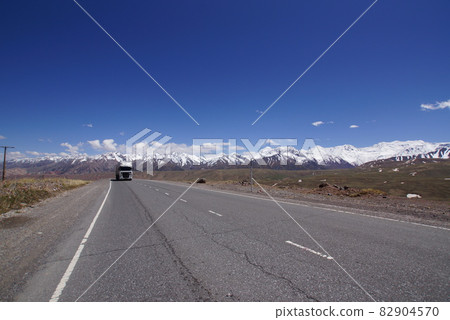 A truck running near the border between China and Kyrgyzstan A truck running near the border between China and Kyrgyzstan 82904570