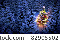 lightened christmas tree surrounded by snow-covered pine trees at night 82905502