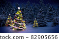 shiny Christmas tree before snow covered forest at night 82905656
