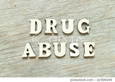 Alphabet letter in word drug abuse on wood background Alphabet letter in word drug abuse on wood background 82906046