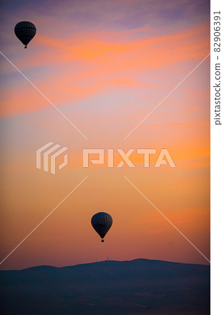 Bright hot air balloons in sky of Cappadocia, Turkey Bright hot air balloons in sky of Cappadocia, Turkey 82906391