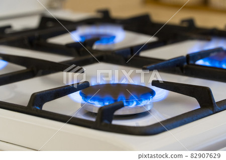 Gas burning in the burner of gas stove, gas shortage and crisis Gas burning in the burner of gas stove, gas shortage and crisis 82907629