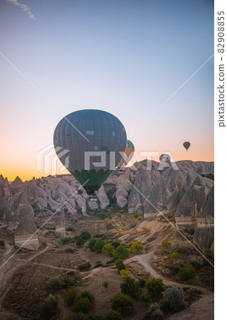 Bright hot air balloons in sky of Cappadocia, Turkey 82908855