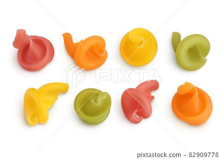 Raw colored pasta isolated on white background with clipping path and full depth of field. Top view. Flat lay 82909778