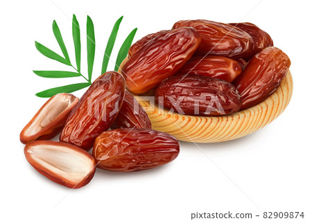 Dates in wooden bowl isolated on white background with clipping path and full depth of field. 82909874