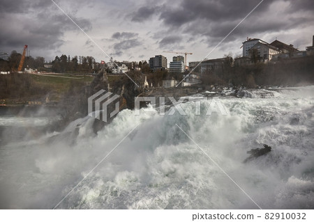 Rhine Falls waterfall in Switzerland, powerful flow in slow motion 82910032