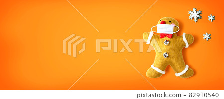 Gingerbread wearing a face mask Gingerbread wearing a face mask 82910540
