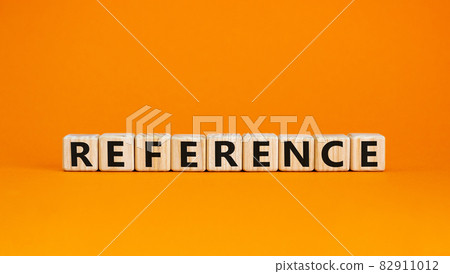 Reference symbol. Wooden cubes with the word 'reference'. Beautiful orange background. Business and reference concept. Copy space. Reference symbol. Wooden cubes with the word 'reference'. Beautiful orange background. Business and reference concept. Copy space. 82911012