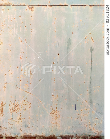 Corroded metal background. Rusty metal background with streaks of rust. Rust stains. Rystycorrosion. 82911824