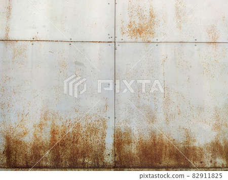 Corroded metal background. Rusty metal background with streaks of rust. Rust stains. Rystycorrosion. Corroded metal background. Rusty metal background with streaks of rust. Rust stains. Rystycorrosion. 82911825