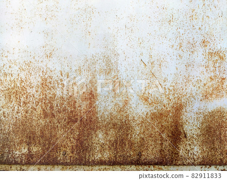 Corroded metal background. Rusty metal background with streaks of rust. Rust stains. Rystycorrosion. Corroded metal background. Rusty metal background with streaks of rust. Rust stains. Rystycorrosion. 82911833