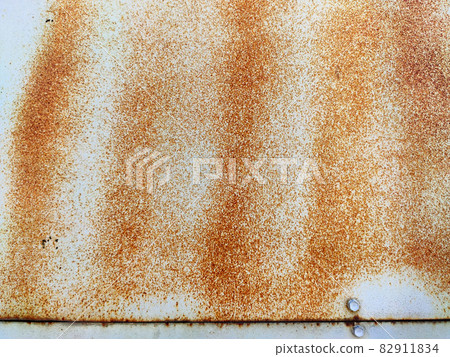 Corroded metal background. Rusty metal background with streaks of rust. Rust stains. Rystycorrosion. Corroded metal background. Rusty metal background with streaks of rust. Rust stains. Rystycorrosion. 82911834