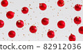 Christmas or New Year holidays background, red baubles with confetti, 3d render 82912036