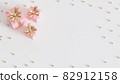 Pink gift boxes with golden ribbon on white background, 3d render 82912158