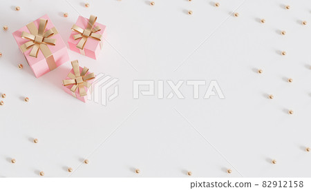 Pink gift boxes with golden ribbon on white background, 3d render 82912158