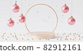 Golden podium or pedestal for products or advertising with baubles and confetti, 3d render 82912161