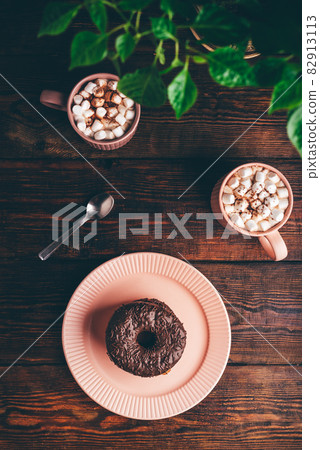Stack of Chocolate Donuts and Hot Chocolate with Marshmallow Stack of Chocolate Donuts and Hot Chocolate with Marshmallow 82913113