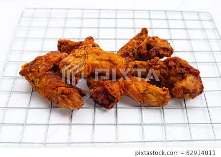 Fried chicken necks on white background. 82914011