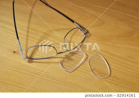 Glasses broken on the floor 82914161