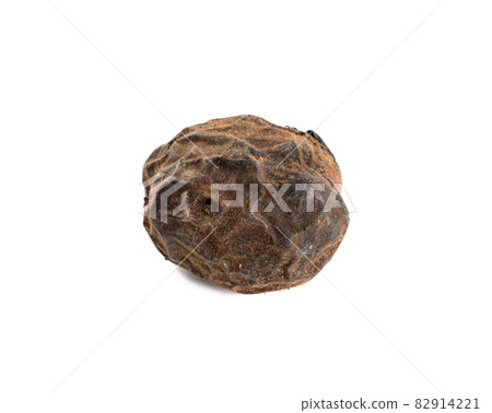 nut in dry brown shell isolated on white background nut in dry brown shell isolated on white background 82914221
