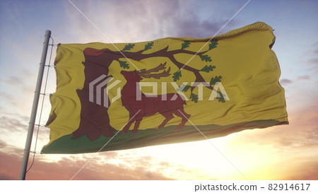 Berkshire flag, England, waving in the wind, sky and sun background. 3d rendering 82914617
