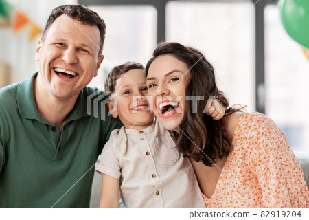 happy family with little son at birthday party happy family with little son at birthday party 82919204