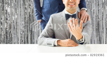 close up of male gay couple with wedding rings on close up of male gay couple with wedding rings on 82919361