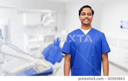 happy indian doctor or dentist at dental office 82920661