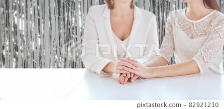 close up of happy married lesbian couple hands close up of happy married lesbian couple hands 82921210