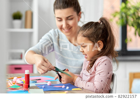 daughter with mother making applique at home daughter with mother making applique at home 82922157