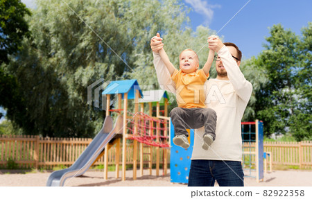 father with son playing and having fun 82922358