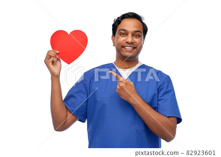 smiling male doctor with red heart on clipboard smiling male doctor with red heart on clipboard 82923601