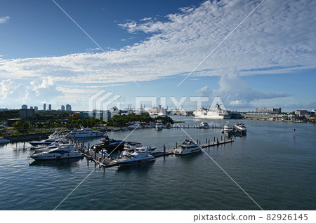 Island Gardens Deep Harbour Marina under summer cloudscape in Miami. Island Gardens Deep Harbour Marina under summer cloudscape in Miami. 82926145