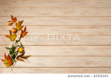 Fall apples, snowberry, leaves background Fall apples, snowberry, leaves background 82926263