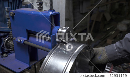 Image of man working on sheet bending machine Image of man working on sheet bending machine 82931159